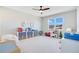 Playful bedroom with ample storage and toys at 2730 Meadow Sage Ct, Oviedo, FL 32765