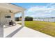 Relaxing covered patio overlooking a lake at 3032 Ella Way, St Cloud, FL 34771