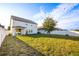 Spacious backyard with grassy lawn and privacy fence at 3439 Feathergrass Ct, Harmony, FL 34773