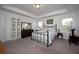 Bedroom with metal bed frame, dresser, and shelving at 3439 Feathergrass Ct, Harmony, FL 34773