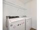 Laundry room with Whirlpool washer and dryer at 3439 Feathergrass Ct, Harmony, FL 34773