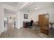 Home office with wooden desk, chair, and cabinets at 3439 Feathergrass Ct, Harmony, FL 34773