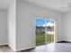 Bright dining room with sliding glass doors and backyard view at 3482 Forster Ave, Leesburg, FL 34748