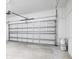 Clean garage with automatic garage door at 3482 Forster Ave, Leesburg, FL 34748