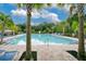 Community pool with lounge chairs at 3482 Forster Ave, Leesburg, FL 34748