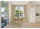 Bright breakfast nook with tile floors and a scenic view of the outdoors at 5024 St Andrews Arc, Leesburg, FL 34748
