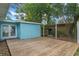 Backyard with wooden deck and grassy area at 514 S Crystal Lake Dr, Orlando, FL 32803