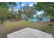 Large backyard with grassy area and wooden fence at 514 S Crystal Lake Dr, Orlando, FL 32803