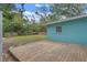 Backyard with wooden deck and grassy area at 514 S Crystal Lake Dr, Orlando, FL 32803