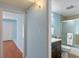Small bathroom with dark vanity and shower/tub combo at 514 S Crystal Lake Dr, Orlando, FL 32803