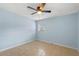 Bedroom with light blue walls and ceiling fan at 514 S Crystal Lake Dr, Orlando, FL 32803