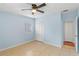 Light blue bedroom with tiled floors and ceiling fan at 514 S Crystal Lake Dr, Orlando, FL 32803