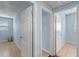 Hallway with light blue walls and access to bedrooms at 514 S Crystal Lake Dr, Orlando, FL 32803