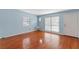 Bright living room with hardwood floors and light blue walls at 514 S Crystal Lake Dr, Orlando, FL 32803