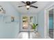 Sunroom with ceiling fan and French doors to backyard at 514 S Crystal Lake Dr, Orlando, FL 32803