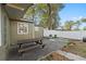 A backyard with a large picnic table for entertaining at 5607 Huber Dr, Orlando, FL 32818