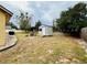 Backyard with shed and partial view of fence at 567 Rachael Court, Oviedo, FL 32765