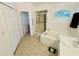 Main bathroom with double vanity, walk-in shower, and soaking tub at 567 Rachael Court, Oviedo, FL 32765
