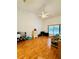 Primary bedroom with vaulted ceiling, wood floors, and ample natural light at 567 Rachael Court, Oviedo, FL 32765