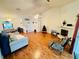 Spacious living room with hardwood floors and a fireplace at 567 Rachael Court, Oviedo, FL 32765