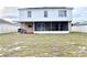 Large backyard with screened porch and shed at 5861 Windridge Dr, Winter Haven, FL 33881