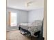 Bedroom with a queen-size bed and window at 5861 Windridge Dr, Winter Haven, FL 33881