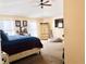 Large bedroom with a king-size bed and a large armoire at 5861 Windridge Dr, Winter Haven, FL 33881