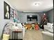 Gathering room with two sofas, a TV, and a Christmas tree at 5861 Windridge Dr, Winter Haven, FL 33881