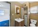 Bathroom features a sink, toilet, and water heater at 637 19Th St, Orlando, FL 32805