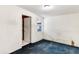 Empty bedroom with blue carpet and window at 637 19Th St, Orlando, FL 32805