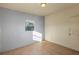 Spacious bedroom with tiled floors and window at 637 19Th St, Orlando, FL 32805