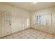 Bedroom with tile floor, door and window at 637 19Th St, Orlando, FL 32805