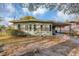 Light green house with carport and neat lawn at 637 19Th St, Orlando, FL 32805