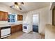 Kitchen with wood cabinets and electric range at 637 19Th St, Orlando, FL 32805