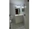 Bathroom with vanity, mirror, and updated light fixtures at 912 Lake Destiny Rd # G, Altamonte Springs, FL 32714
