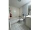 Clean bathroom with a bathtub, toilet, and vanity at 912 Lake Destiny Rd # G, Altamonte Springs, FL 32714