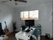 Home office bedroom with hardwood floors and large window at 912 Lake Destiny Rd # G, Altamonte Springs, FL 32714