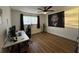 Bedroom with hardwood floors, a desk, and a large window at 912 Lake Destiny Rd # G, Altamonte Springs, FL 32714