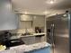 Modern kitchen with stainless steel appliances at 912 Lake Destiny Rd # G, Altamonte Springs, FL 32714