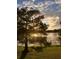 Scenic sunset view of lake from property at 912 Lake Destiny Rd # G, Altamonte Springs, FL 32714