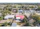 Aerial view of home featuring red roof and fenced yard at 930 Lewis Dr, Daytona Beach, FL 32117