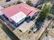 Aerial view of backyard featuring a fire pit and outdoor seating at 930 Lewis Dr, Daytona Beach, FL 32117