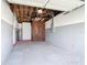 Spacious garage featuring concrete floors and exposed ceiling at 930 Lewis Dr, Daytona Beach, FL 32117