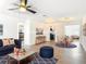 Stylishly staged living room showcasing modern decor, hardwood floors, and abundant natural light at 930 Lewis Dr, Daytona Beach, FL 32117