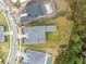 Bird's-eye view of a modern home, showcasing its spacious layout and landscaped surroundings at 9847 Laurel Berry Dr, Orlando, FL 32827