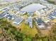 Aerial view of upscale community with lake at 9847 Laurel Berry Dr, Orlando, FL 32827