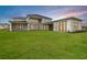Luxury home with expansive backyard and covered patio at 9847 Laurel Berry Dr, Orlando, FL 32827