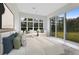 Bedroom with a plush bed and sliding glass doors at 9847 Laurel Berry Dr, Orlando, FL 32827