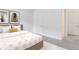 Guest bedroom with a queen-size bed and access to a hallway at 9847 Laurel Berry Dr, Orlando, FL 32827