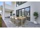Outdoor patio with dining table and chairs at 9847 Laurel Berry Dr, Orlando, FL 32827
